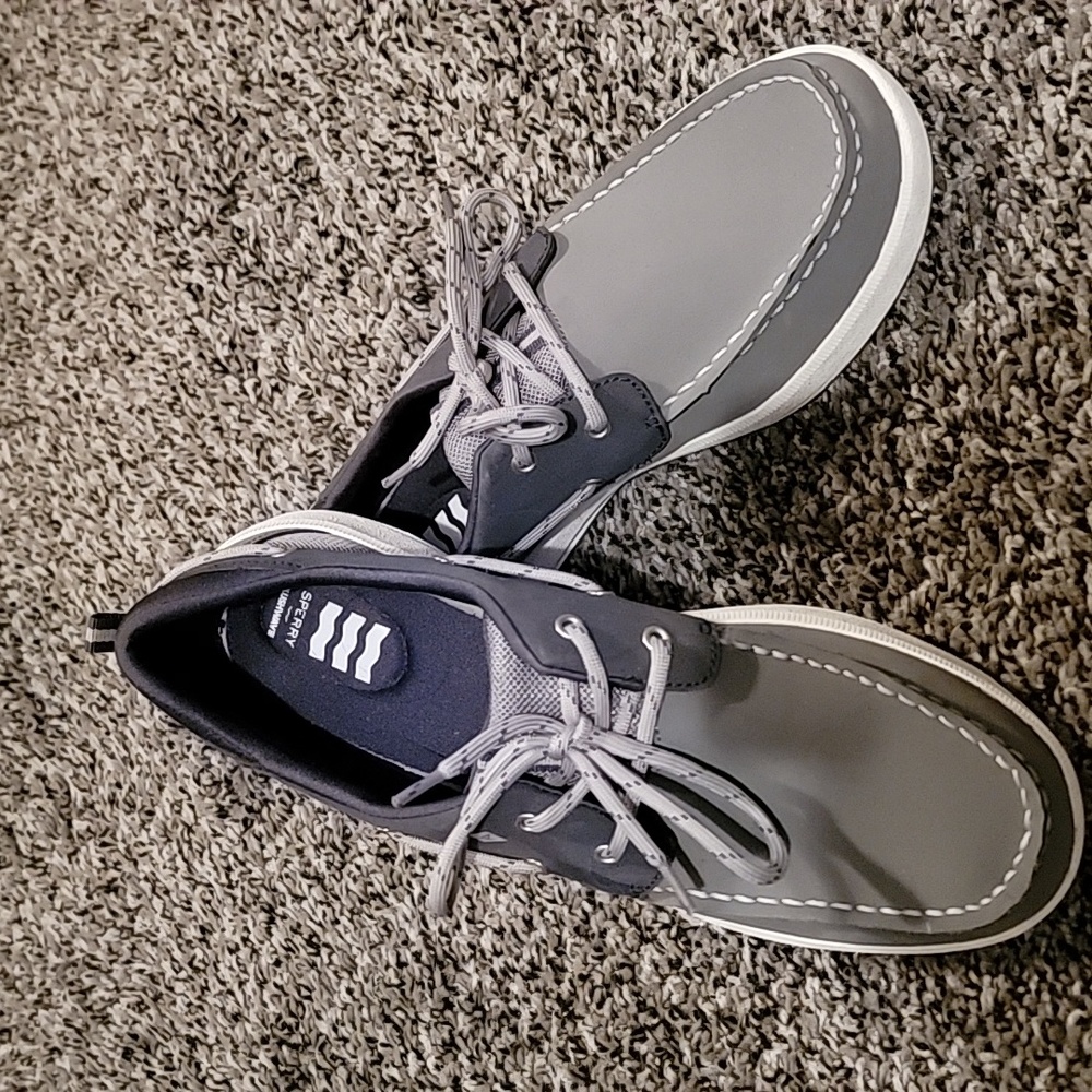 Mens Sperry slip on shoes. Never worn. Size 6.5.